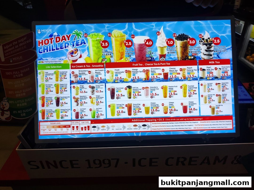 A digital menu board displaying a variety of chilled teas, ice cream, and smoothies with prices.