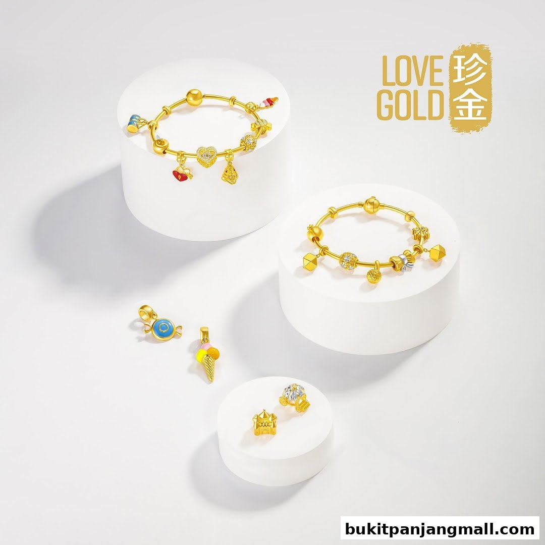 Gold bracelets and charms displayed on white pedestals with a 'Love Gold' logo.