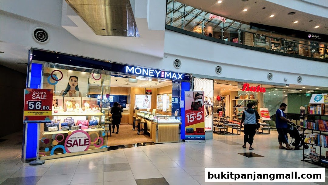 MoneyMax Pawnshop storefront with jewelry displays and sale banners.