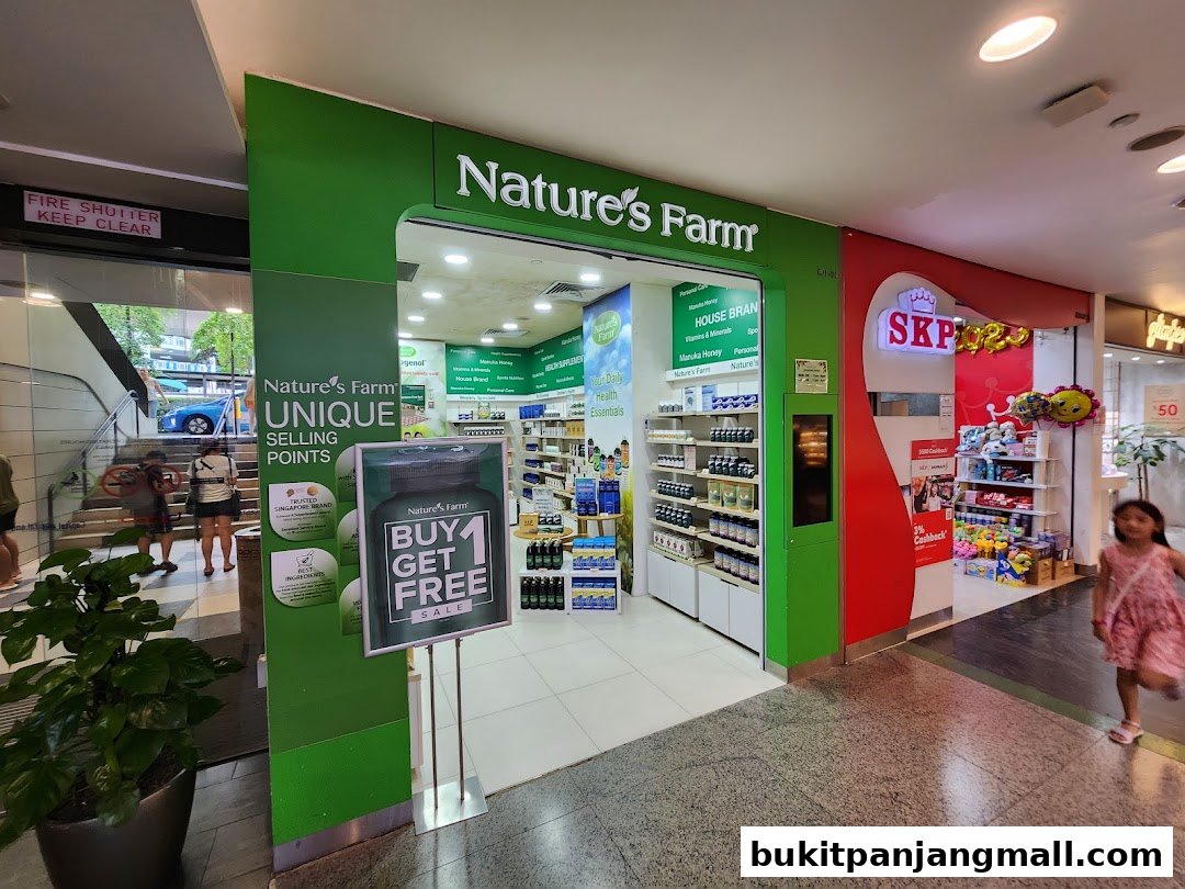 The exterior of Nature's Farm, a health essentials shop, with a 'Buy 1 Get 1 Free' sale sign.