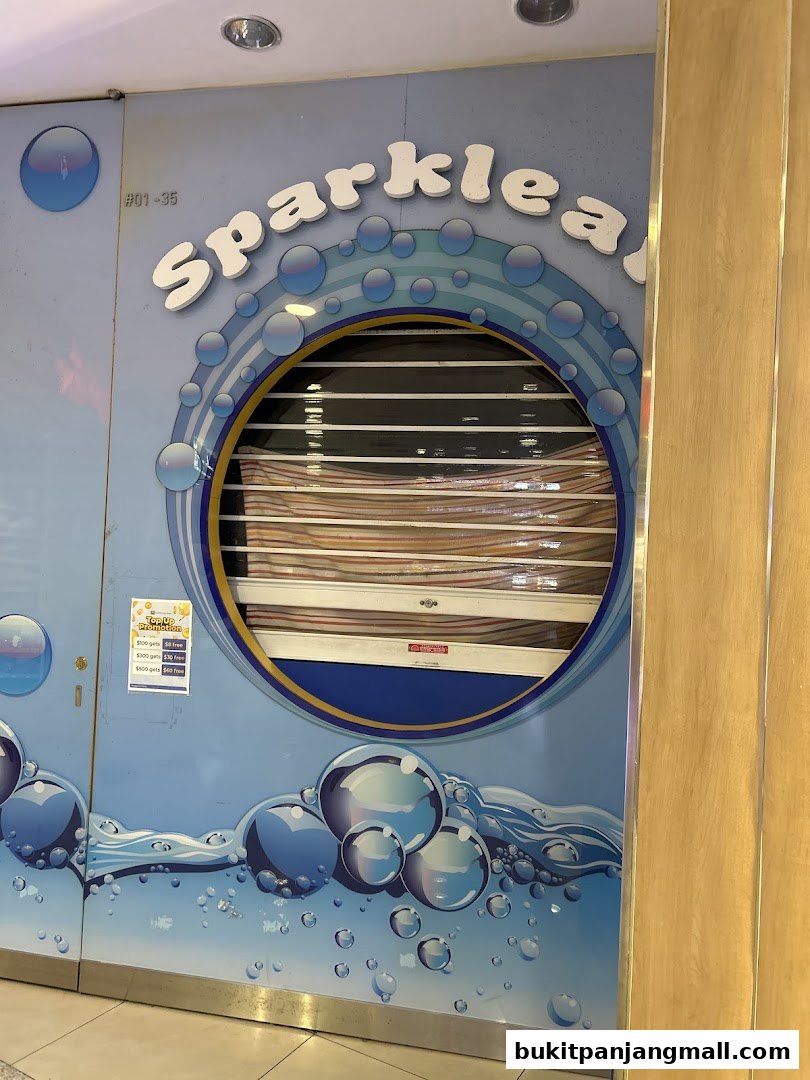 The exterior of a laundry shop with the name 'Sparklean Laundry' and bubble graphics.