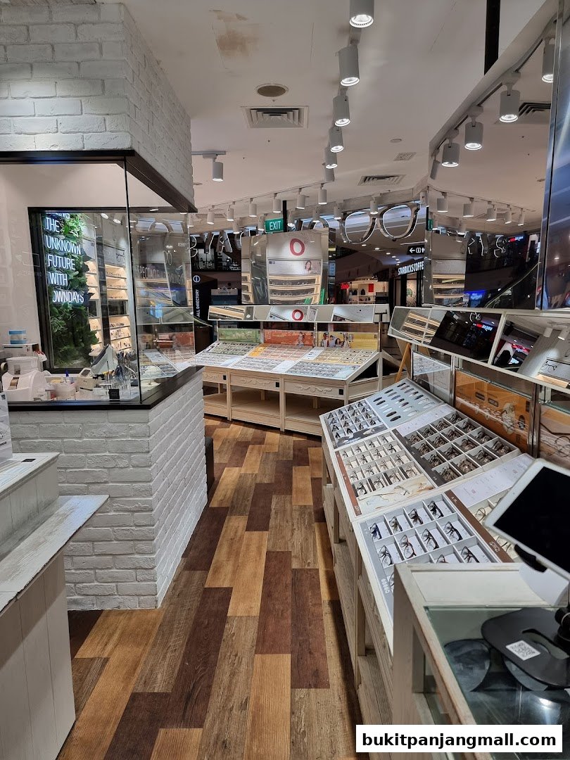 Interior view of an optical shop showcasing various eyeglasses on display stands.