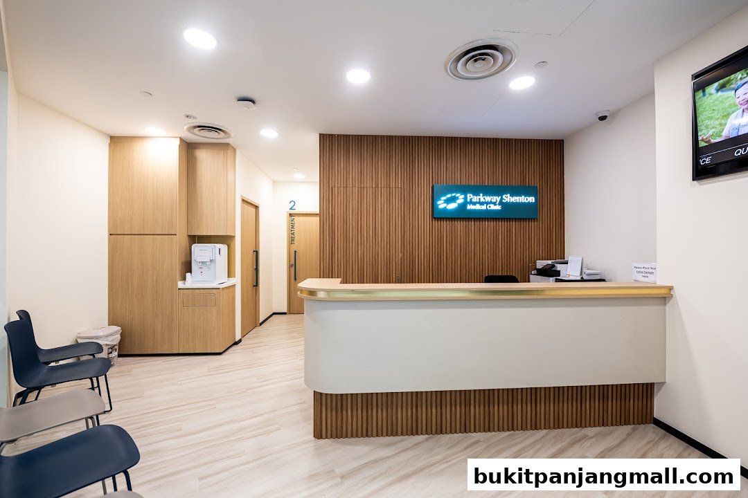 The reception area of Parkway Shenton Medical Clinic with a modern design and comfortable seating.