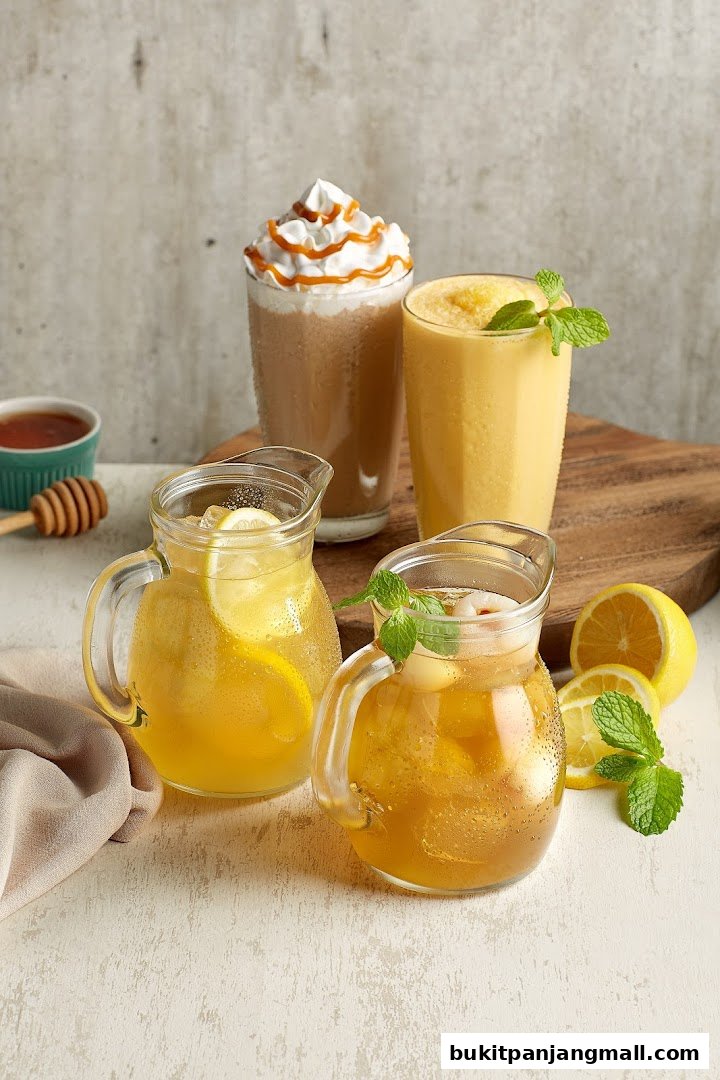 A refreshing assortment of iced beverages, including lemonades and a caramel-topped drink.