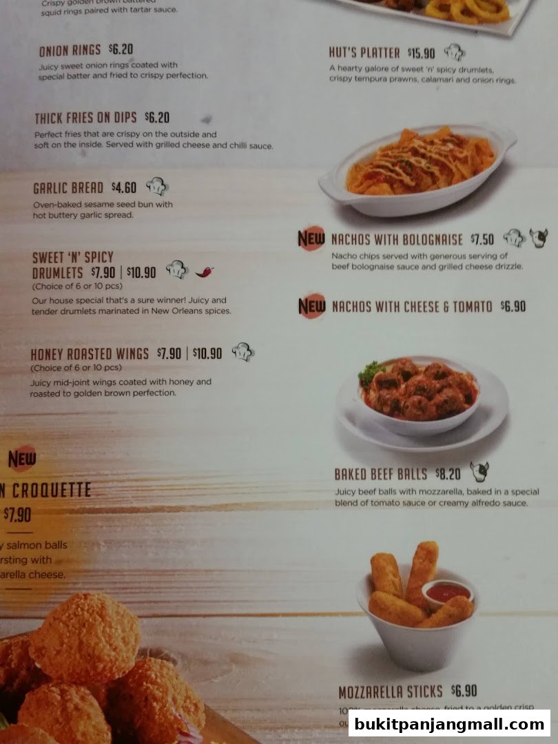 A menu from Pizza Hut featuring various appetizers and sides like onion rings, fries, and drumlets.