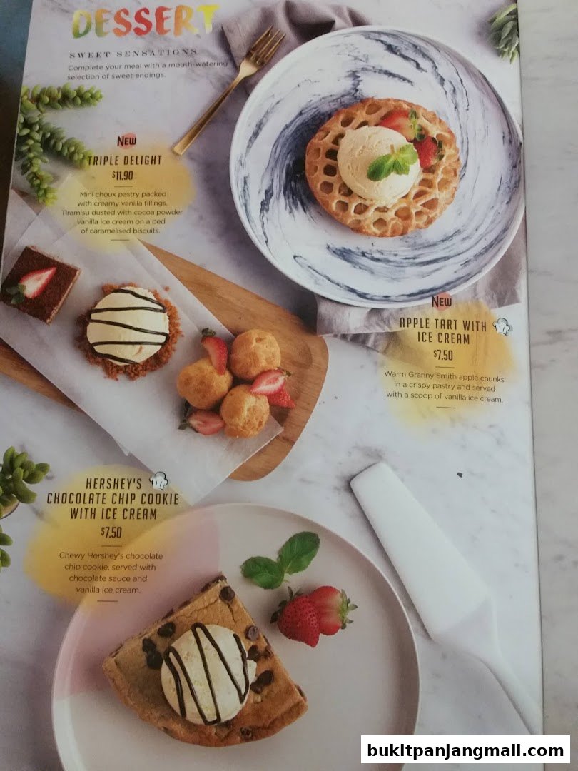 A menu showcasing three delicious dessert options: Triple Delight, Apple Tart with Ice Cream, and Hershey's Chocolate Chip Cookie with Ice Cream.