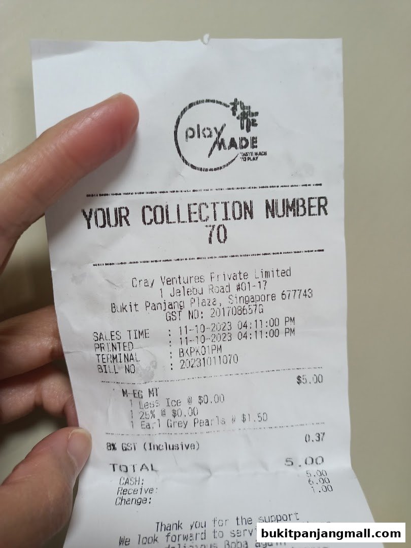 A receipt from PlayMade showing a collection number and purchased items.