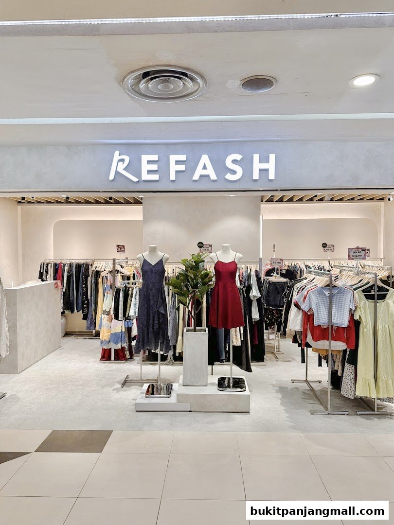 The Refash store features a well-organized display of trendy clothing on racks and mannequins.