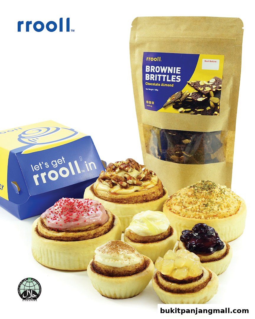 A variety of delicious cinnamon rolls and a bag of brownie brittles from rrooll.