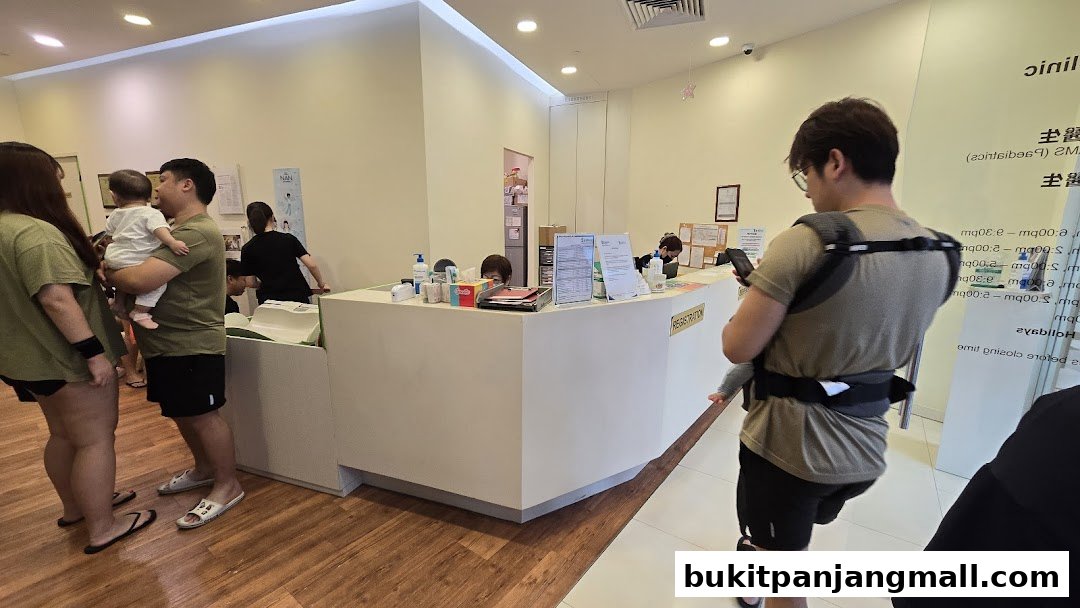 People waiting at the reception of a baby and child clinic.