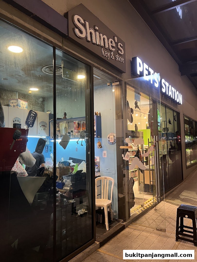 The exterior of Shine's Key and Shoe shop, showcasing its entrance and interior.