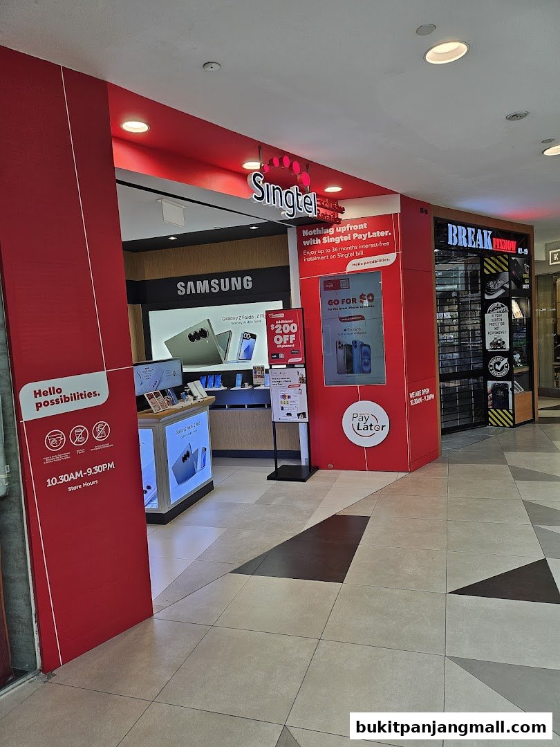 The entrance of a Singtel Exclusive Retailer shop with Samsung products displayed.