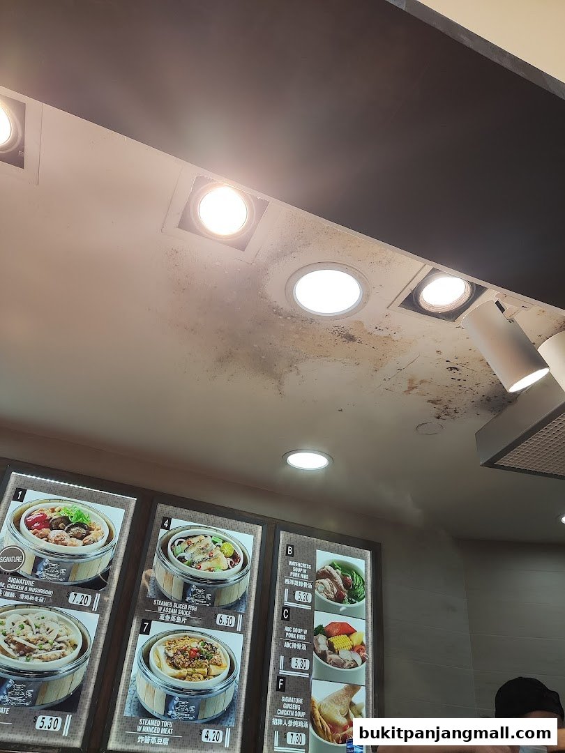 A menu board displaying various steamed dishes and soups with prices.