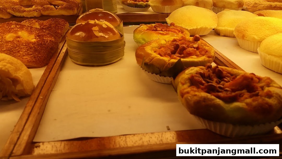 A display of freshly baked pastries and bread at Swee Heng Bakery.