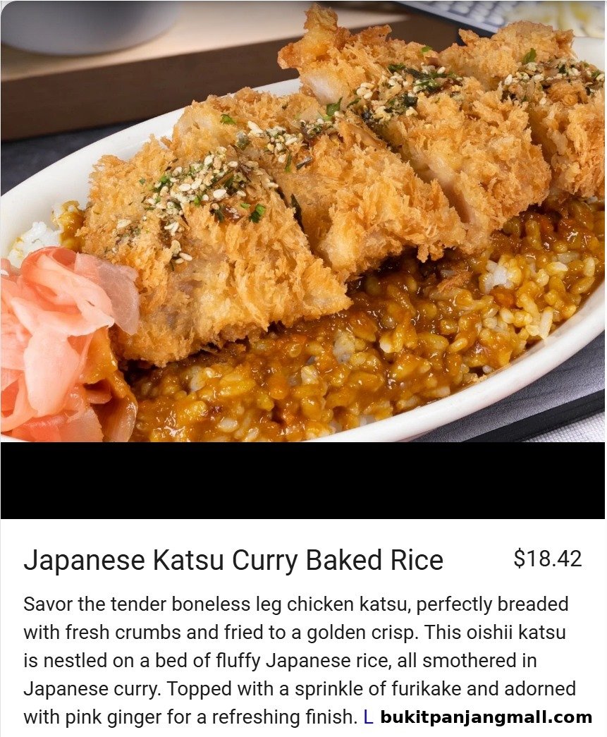 A close-up of Japanese Katsu Curry Baked Rice with crispy chicken and curry sauce.