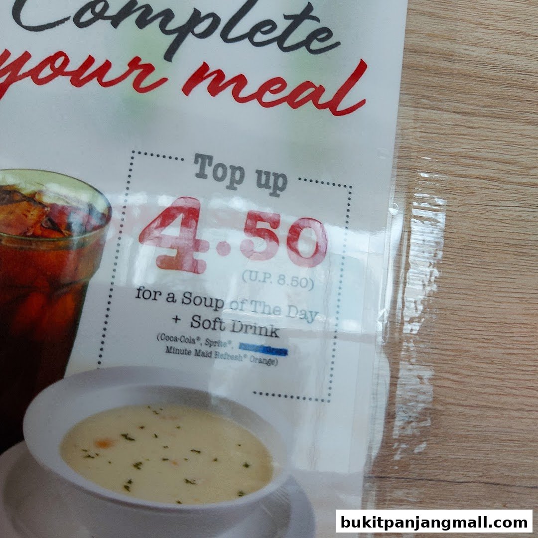 A promotional offer for a soup and soft drink combo at Swensens.