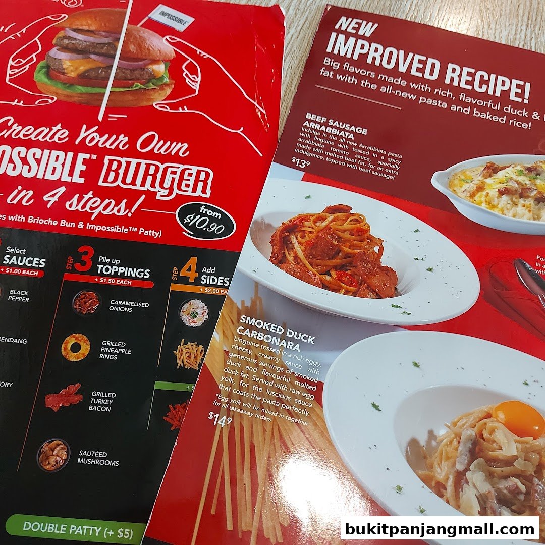A menu showcasing Swensens' new improved recipe with pasta and burger options.