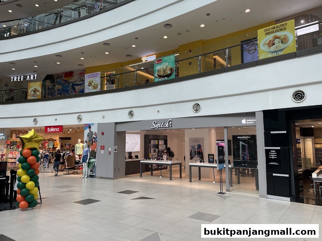 The Switch store, an authorized Apple reseller, is visible in a shopping mall.