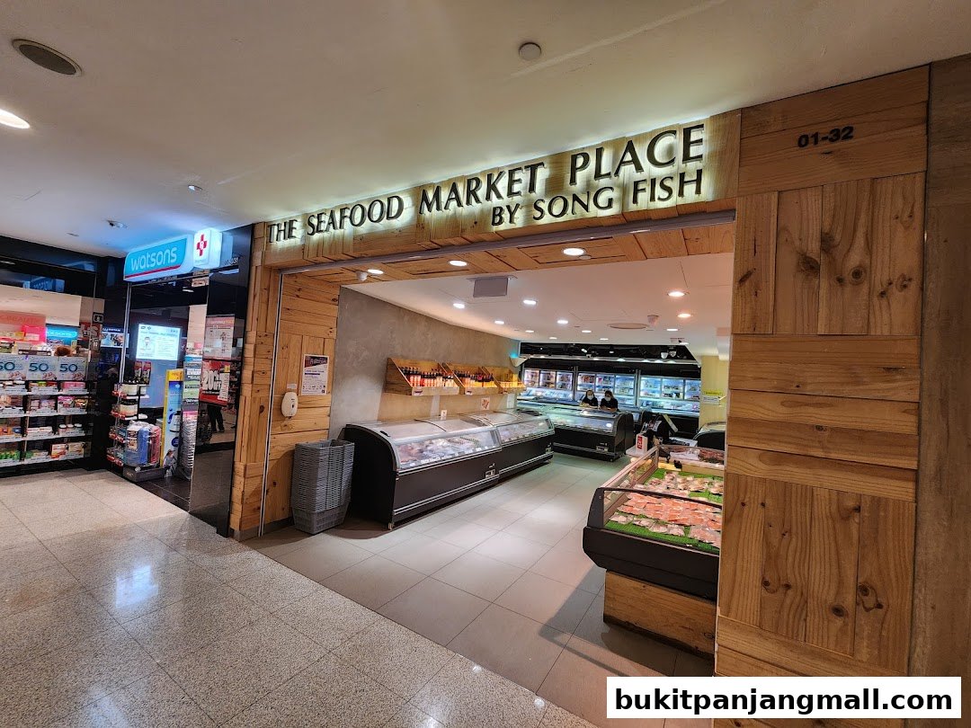The entrance to The Seafood Market Place By Song Fish, showcasing fresh seafood displays.