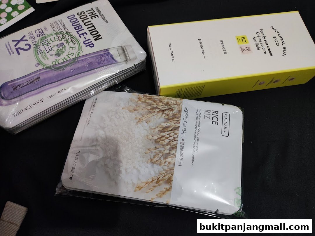 A collection of skincare products from THEFACESHOP, including face masks and sunscreen.