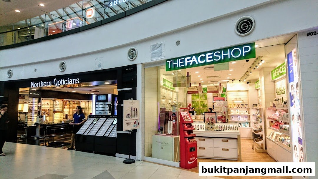 The exterior of THEFACESHOP, a beauty store, showcasing various skincare and makeup products.