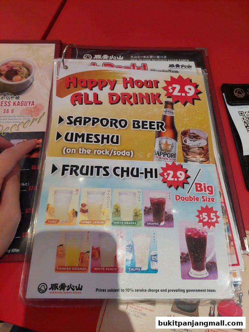 A menu featuring happy hour drinks including Sapporo Beer, Umeshu, and various Fruits Chu-Hi.