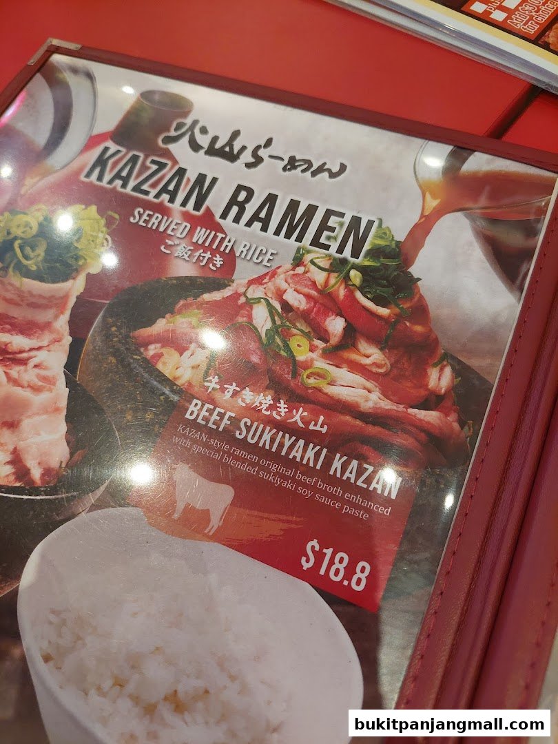 A menu item for Kazan Ramen featuring Beef Sukiyaki Kazan with rice.