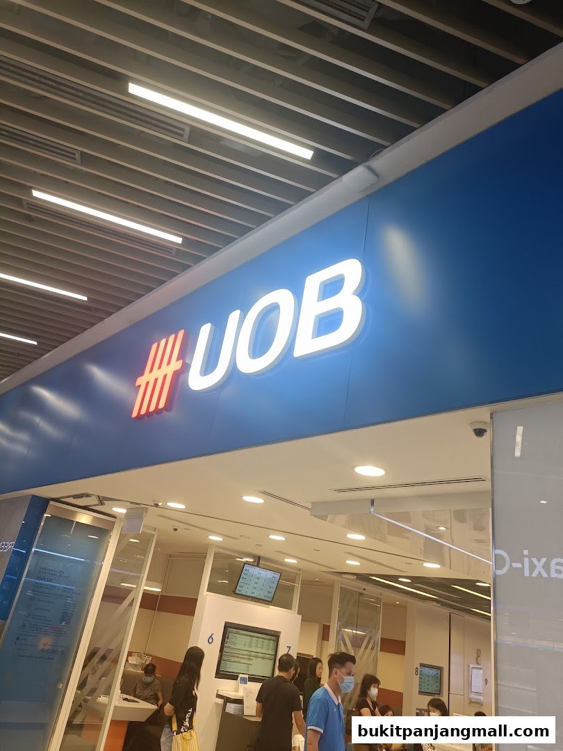 The UOB Bukit Panjang Branch entrance with its prominent blue and white signage and interior visible.