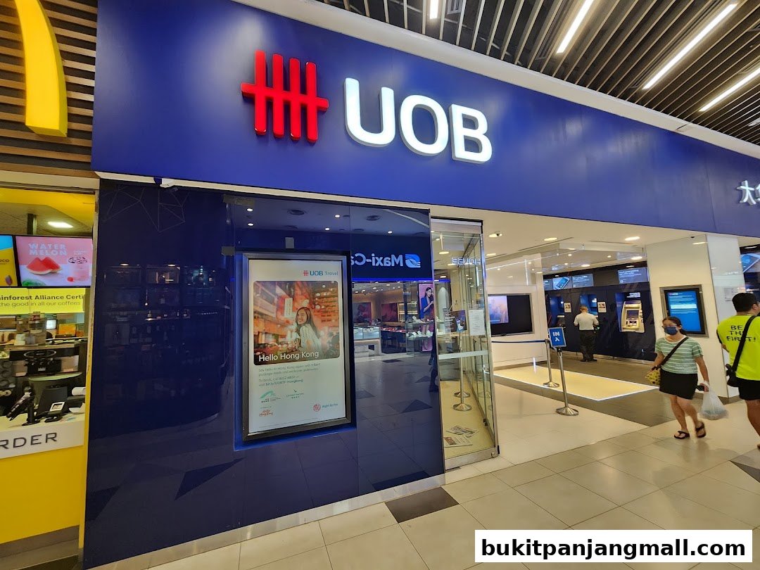 The exterior of a UOB bank branch with its prominent blue signage and glass entrance.