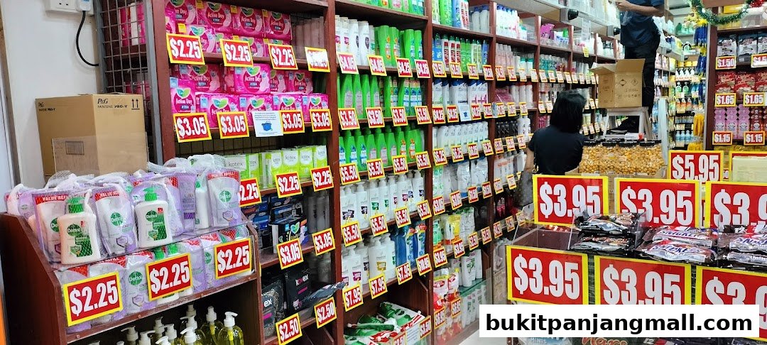 Shelves stocked with personal care products and snacks, many with price tags.