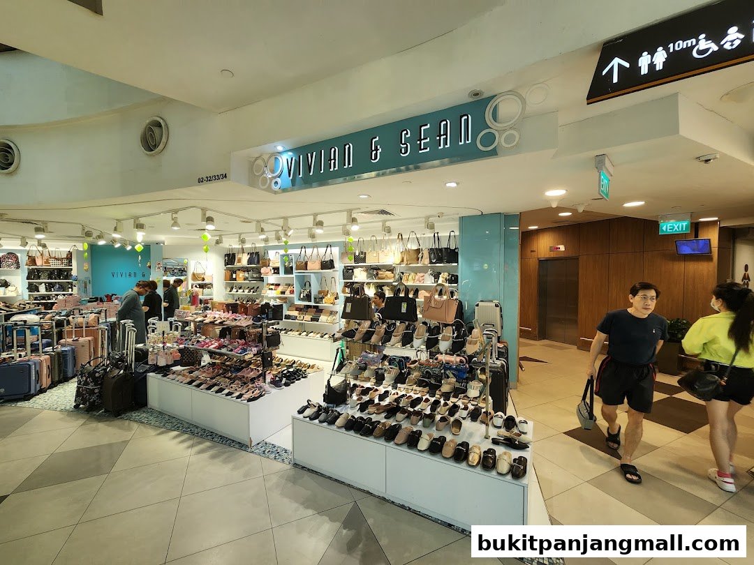 Vivian & Sean shop interior displaying a wide selection of shoes and handbags.