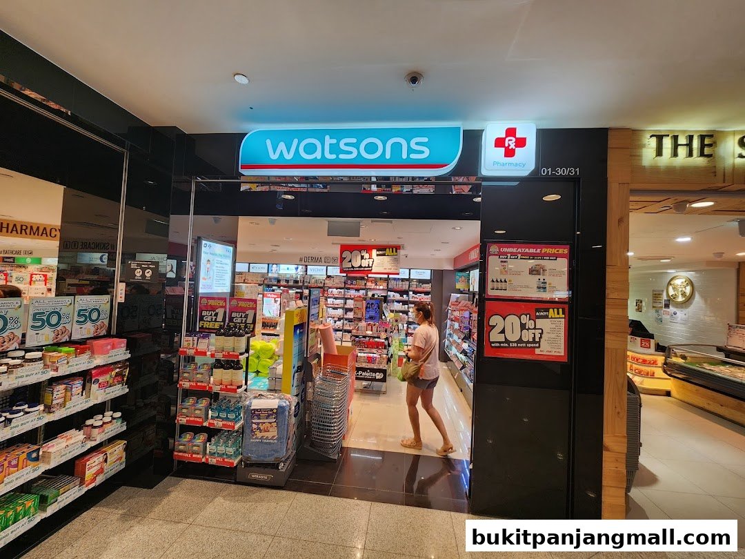 The entrance to a Watsons pharmacy and health store, showcasing promotions and products.