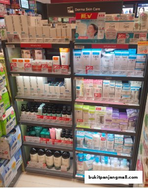 A display of skincare and beauty products, featuring brands like Neostrata and Curel.