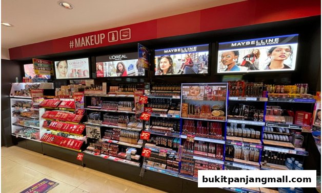 A wide selection of makeup products from brands like L'Oreal and Maybelline is displayed.