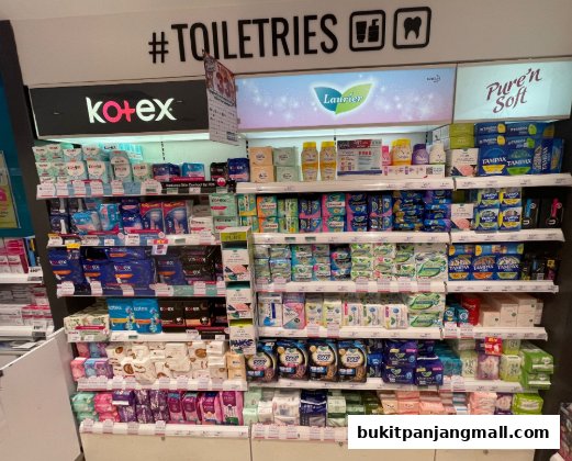Shelves stocked with a wide variety of sanitary pads and feminine hygiene products.