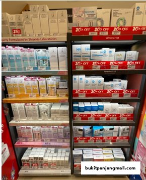 Shelves stocked with various skincare and beauty products, many with 20% off discounts.