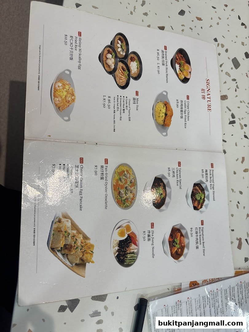 A menu from Xi Men Jie featuring Taiwanese meals with various dishes and prices.