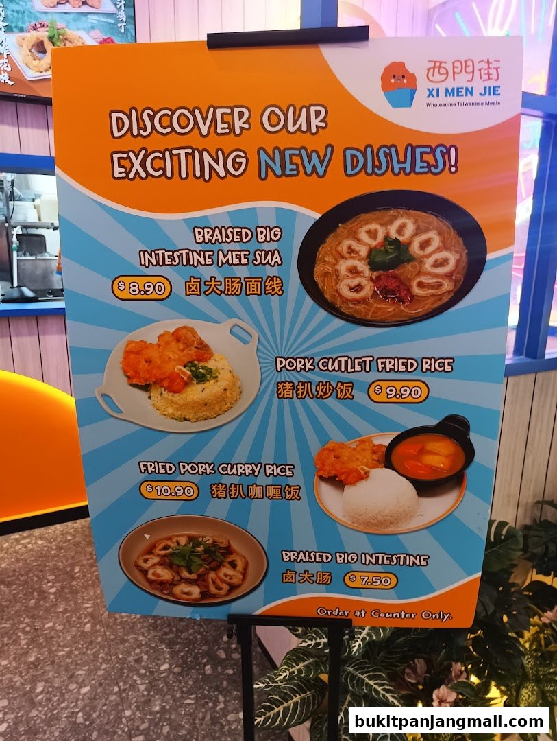 A sign advertising new Taiwanese dishes from Xi Men Jie, featuring images and prices of various meals.