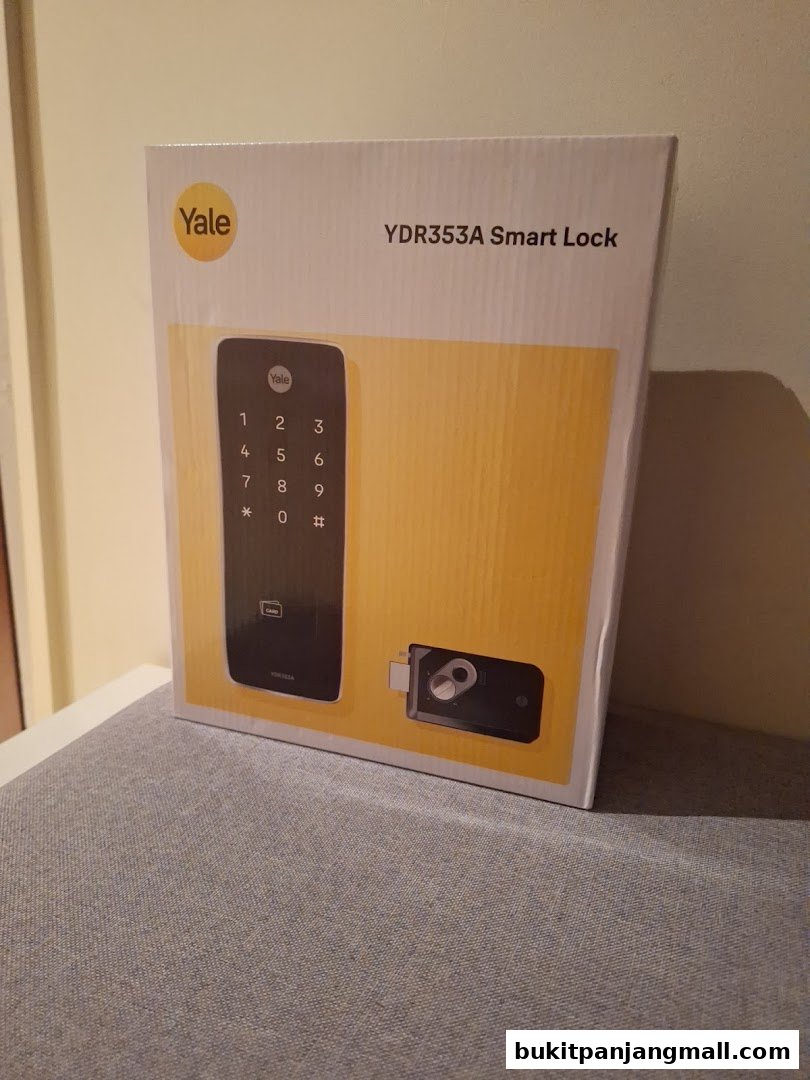 A Yale YDR353A Smart Lock is displayed on its product packaging.