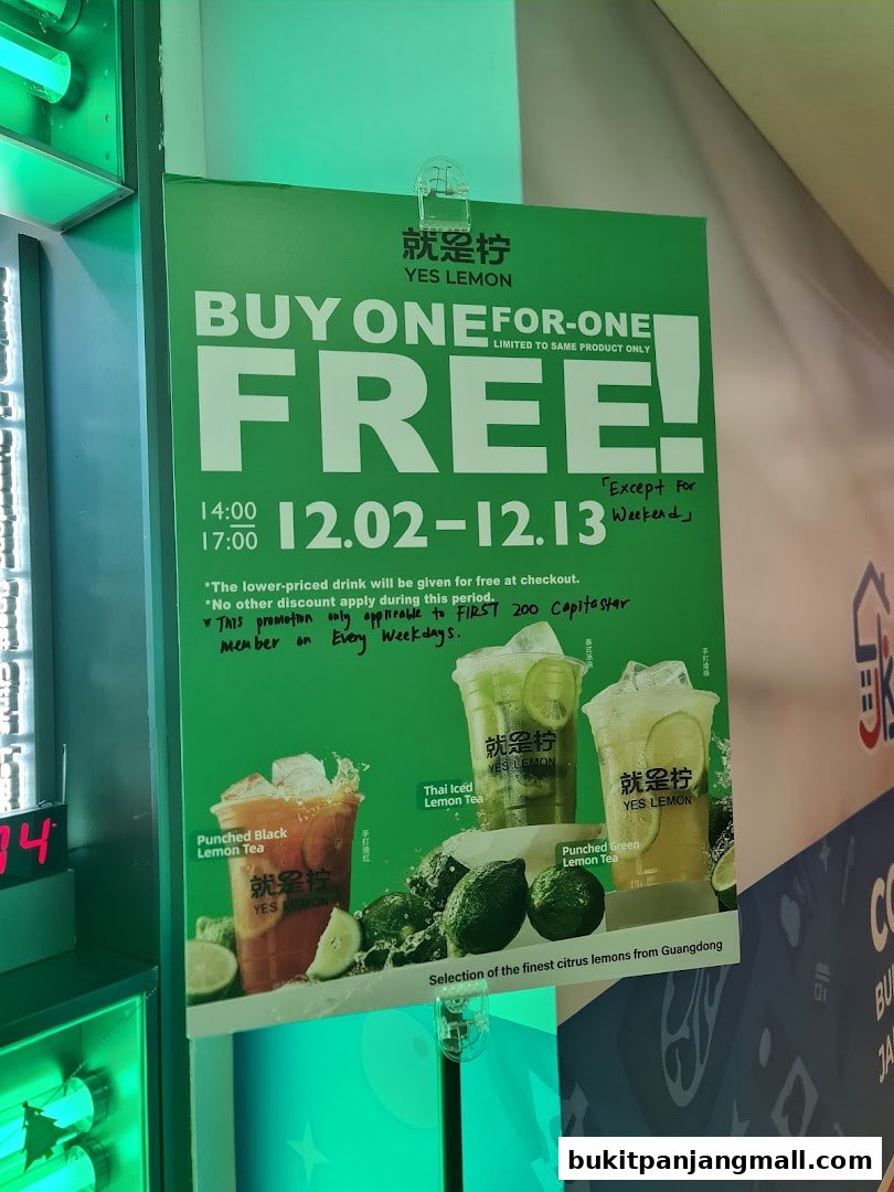 A promotional poster for YES LEMON offering a buy one, get one free deal on lemon teas.