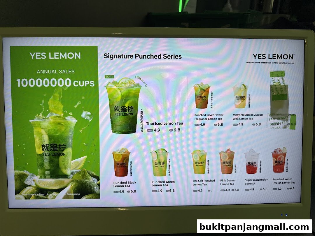 A digital menu board displaying various lemon tea drinks from YES LEMON.