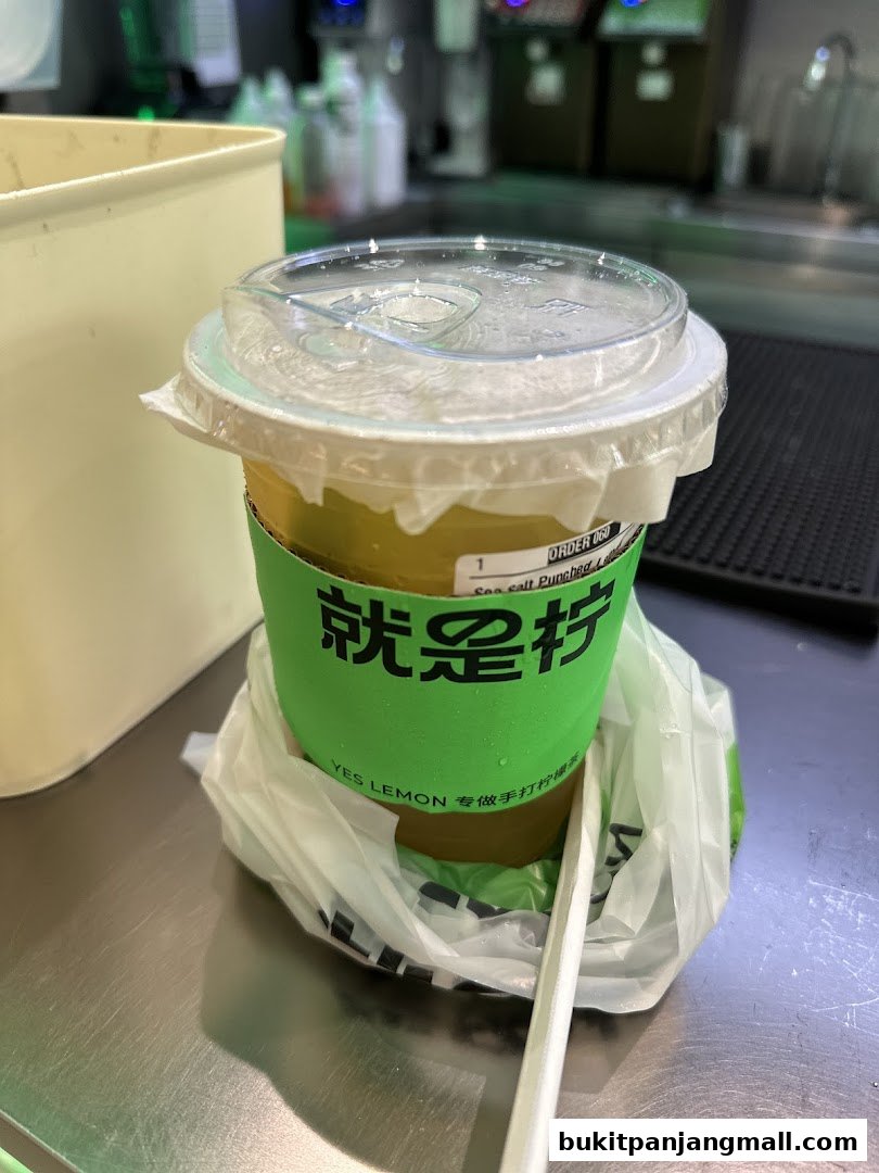 A close-up of a refreshing drink from YES LEMON BPP, ready for takeaway.