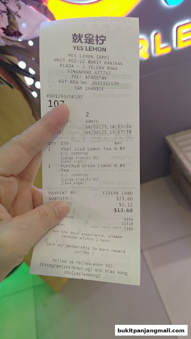 A receipt from YES LEMON showing purchased drinks and payment details.