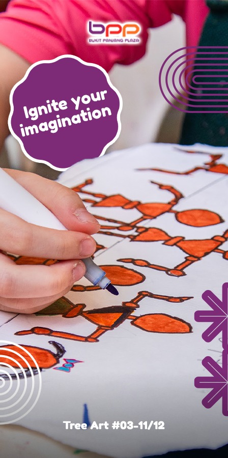 A young artist working on a vibrant canvas at TREE ART